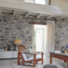 pierre parement manoir gris posé sur les murs d'une maison en intérieur