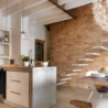 pierre parement rocky mountain orangée posée au mur intérieur d'une maison