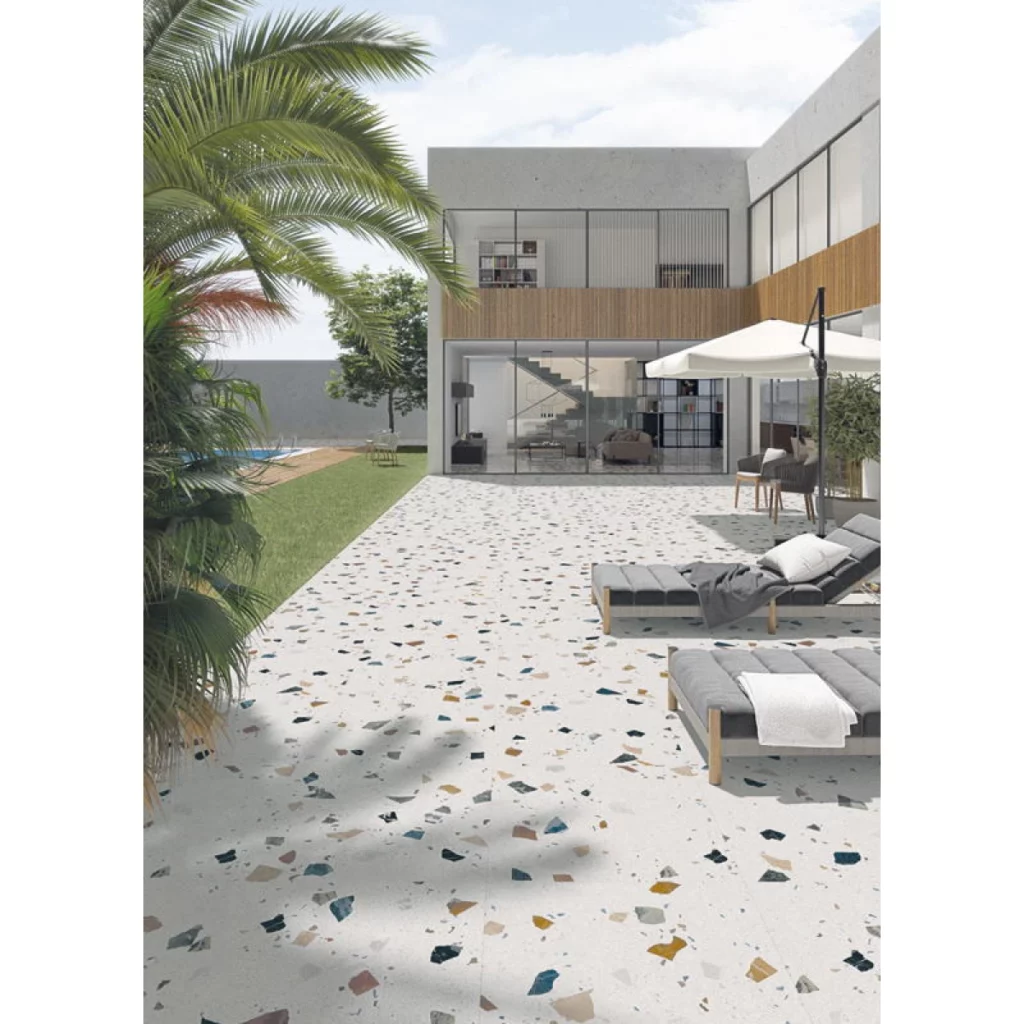 Terrasse en carrelage motif terrazo devant une maison design