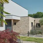 façade de maison en pierre de parement cubik