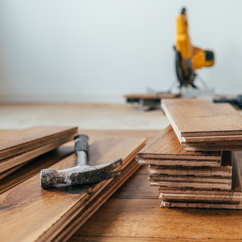 Guide pose de parquet massif sur carrelage